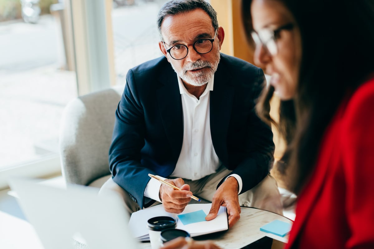 Business professional using AI-powered SEO and digital marketing analytics dashboard representing Generative Engine Optimization for improved online visibility
