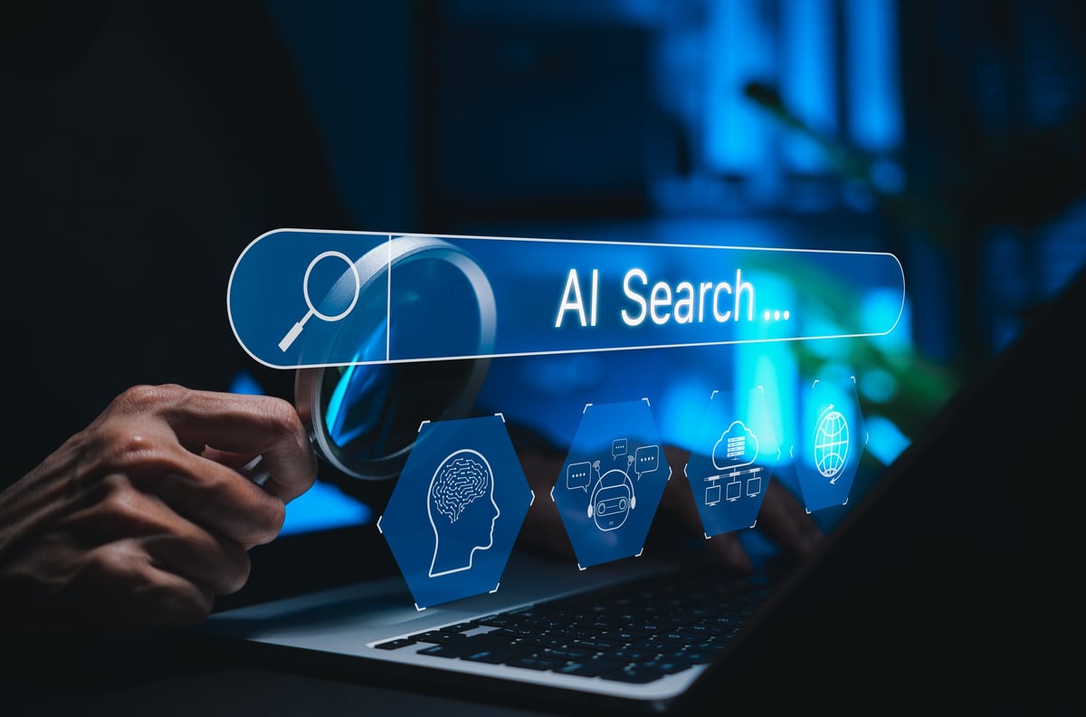 Person using laptop with AI search engine interface showing how Content360 content infrastructure supports visibility across ChatGPT, Gemini, and Perplexity