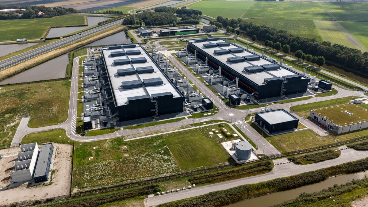 Aerial view of a modern data center with rows of server racks — LinkedIn automation infrastructure for professional client acquisition
