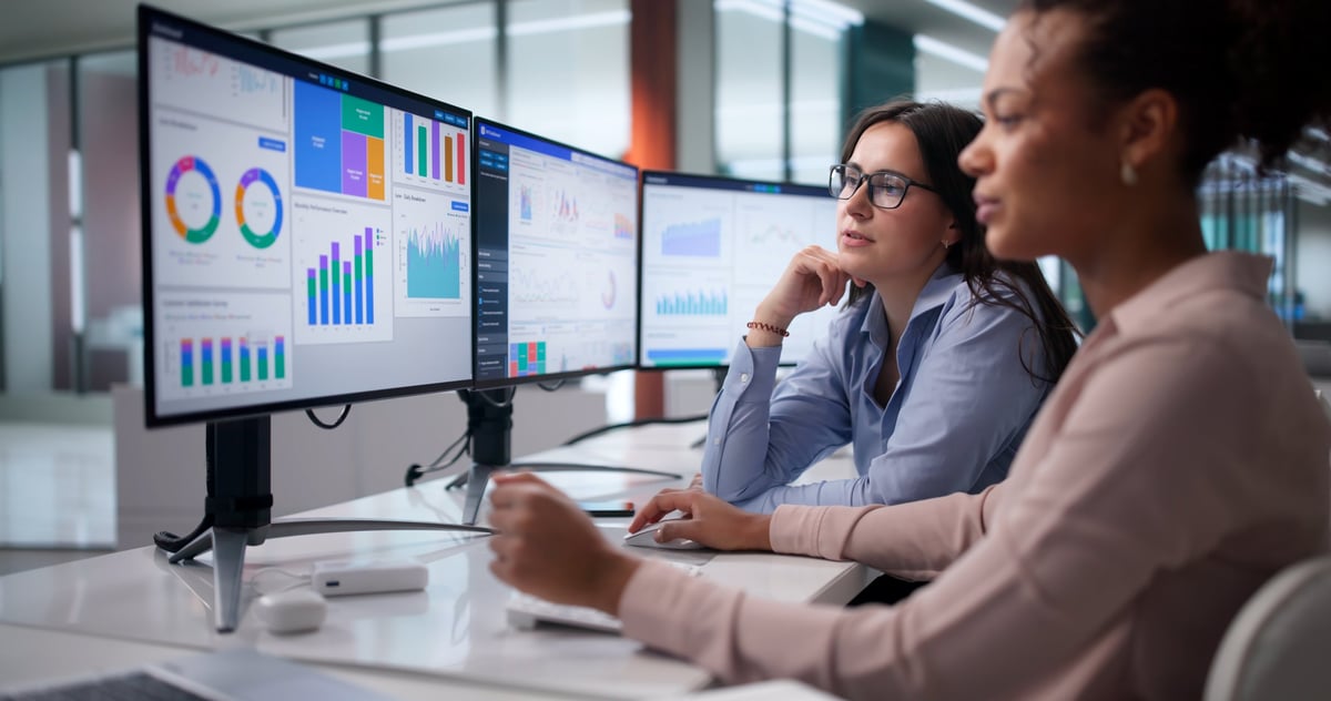 Team reviewing analytics — Optnx builds data-driven acquisition systems